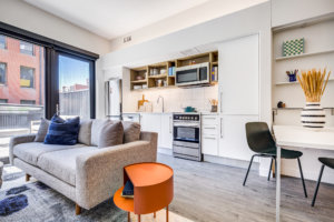 2 Residences at Market Station POI Model 1 Living KitchenWide 6605 300x200